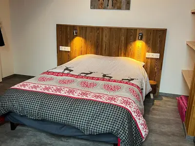 Un ou plusieurs lits dans un hébergement de l'établissement Appartement moderne à La Bresse, 2 chambres, accès PMR - FR-1-589-687