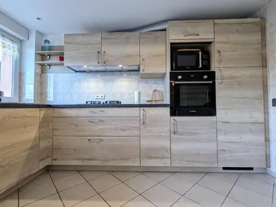 Cuisine ou kitchenette dans l'établissement Appartement chaleureux, 2-4 pers, Vosges, Animaux admis - FR-1-589-685