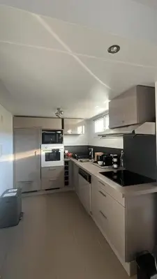 Cuisine ou kitchenette dans l'établissement Studio aux pieds des vignes
