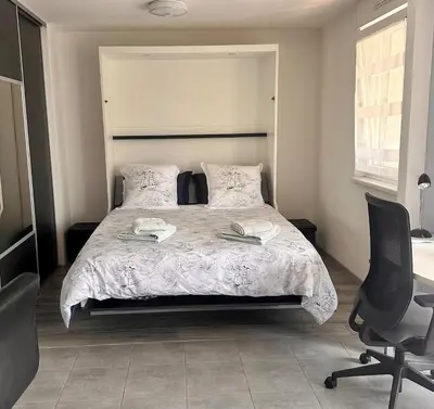 Un ou plusieurs lits dans un hébergement de l'établissement Studio Chevêche - Chic et calme