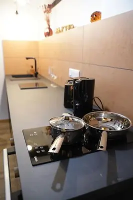 Cuisine ou kitchenette dans l'établissement Au Refuge des amoureux avec baignoire Balnéo 2 personnes