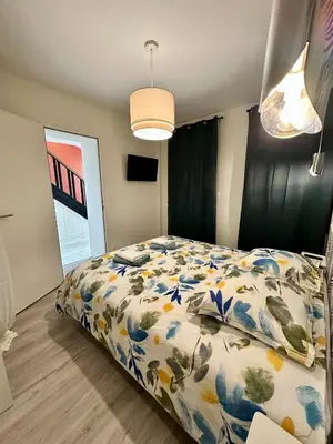 Un ou plusieurs lits dans un hébergement de l'établissement Le Duplex du Parc - Terrasse