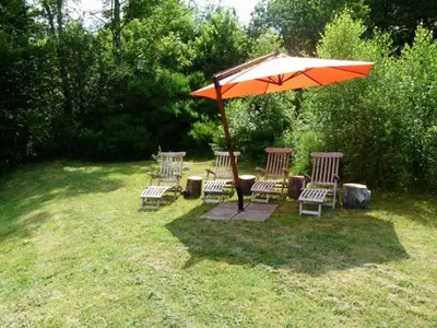 Jardin de l'établissement Gîte montagnard confortable avec terrasse et WIFI - FR-1-589-751