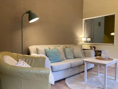 Coin salon dans l'établissement Gîte montagnard confortable avec terrasse et WIFI - FR-1-589-751