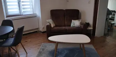 Coin salon dans l'établissement Appartement F2