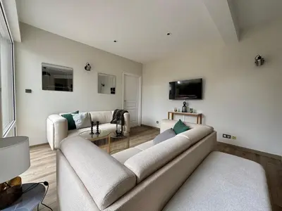 Télévision ou salle de divertissement dans l'établissement Gîte ARTHUR