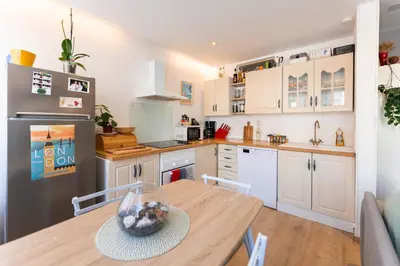 Cuisine ou kitchenette dans l'établissement Le petit Nieder - Colmar Centre