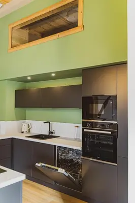 Cuisine ou kitchenette dans l'établissement La Flânerie, spacieux loft au calme avec jacuzzi