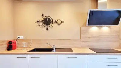 Cuisine ou kitchenette dans l'établissement La grange d'Andre - Spa - 8 personnes - Proche Europa Park