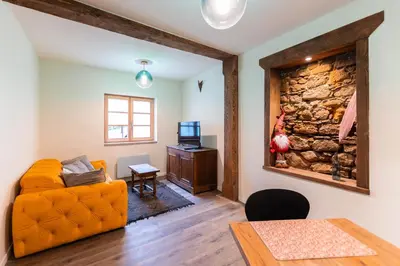 Coin salon dans l'établissement Zellenberg - Les Amandiers - Spa & Sauna