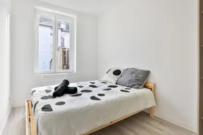 Un ou plusieurs lits dans un hébergement de l'établissement Signature Premium Modern Suite, Free Parking, MULHOUSE CENTRE