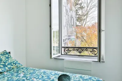 Un ou plusieurs lits dans un hébergement de l'établissement Signature Premium Modern Suite, Free Parking, MULHOUSE CENTRE