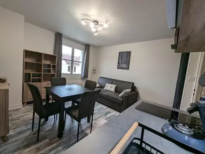 Coin salon dans l'établissement Chez Paulette, Studio cosy au centre ville de Gérardmer