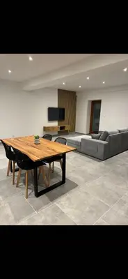 Télévision ou salle de divertissement dans l'établissement Appartement Le Belarya