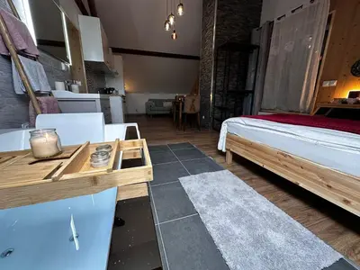 Un ou plusieurs lits dans un hébergement de l'établissement Chalet Bois de Rose