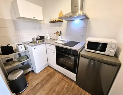 Cuisine ou kitchenette dans l'établissement Studio Cosy- Hyper Centre Ville