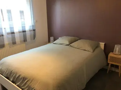 Un ou plusieurs lits dans un hébergement de l'établissement Appartement Les Sorbiers
