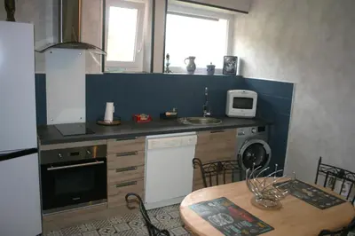 Cuisine ou kitchenette dans l'établissement Gîte étape des Brimbelles
