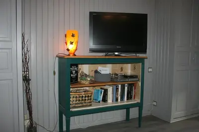 Télévision ou salle de divertissement dans l'établissement Gîte étape des Brimbelles