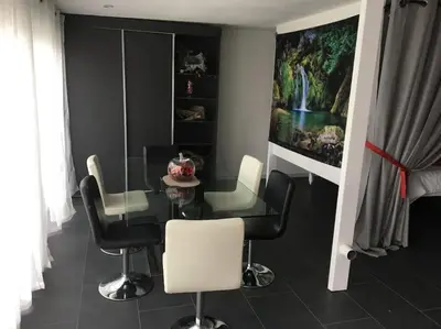 Coin salon dans l'établissement Loft le nid de cigogne