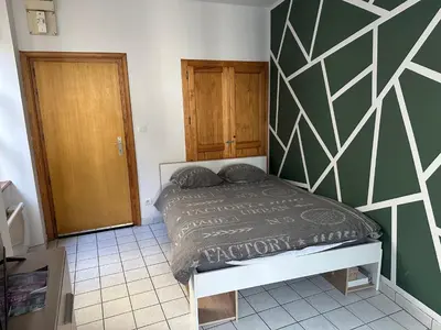 Un ou plusieurs lits dans un hébergement de l'établissement Lure centre