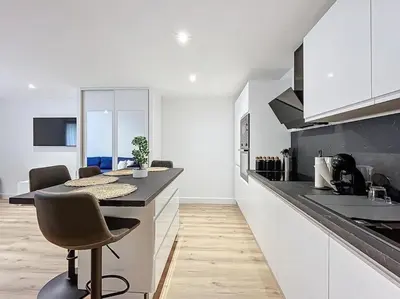 Cuisine ou kitchenette dans l'établissement Escapade confortable et chic parking et vélo-box