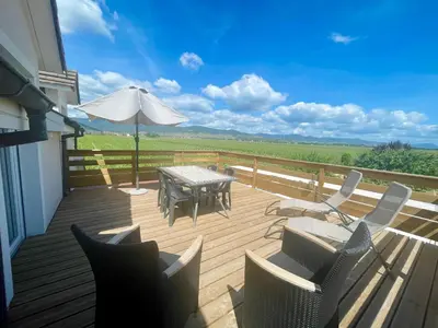Balcon ou terrasse dans l'établissement Envolée des rêves - Terrasse - Parking privé