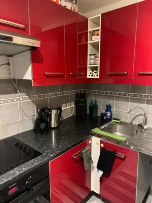 Cuisine ou kitchenette dans l'établissement Le Coin tranquille