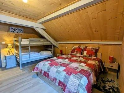 Un ou plusieurs lits dans un hébergement de l'établissement Appartement 42m² cosy avec parking, WiFi, proche pistes, La Bresse - FR-1-589-684