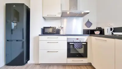 Cuisine ou kitchenette dans l'établissement Le Petit Léon - Colmar - Fibre - RBNB