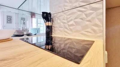 Cuisine ou kitchenette dans l'établissement Le Cozy Urbain - Centre - RBNB