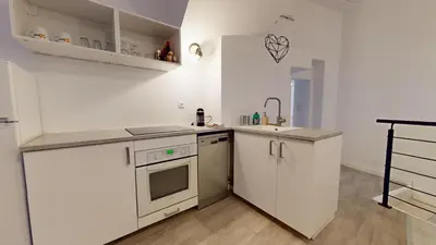 Cuisine ou kitchenette dans l'établissement Le Nid Caché Mulhouse