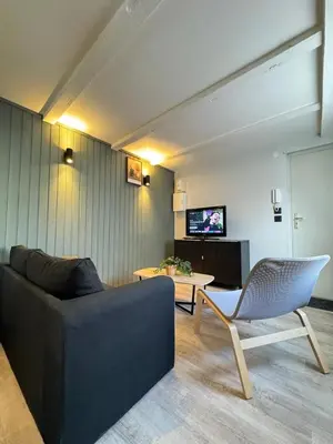 Télévision ou salle de divertissement dans l'établissement ConfortDream