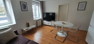 Télévision ou salle de divertissement dans l'établissement DMC One