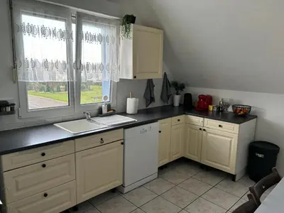 Cuisine ou kitchenette dans l'établissement Gîte Belle étoile