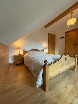 Un ou plusieurs lits dans un hébergement de l'établissement Le Chalet des Vanneaux