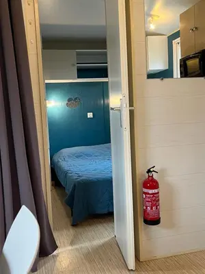 Un ou plusieurs lits dans un hébergement de l'établissement Mobile home