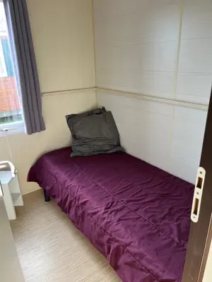 Un ou plusieurs lits dans un hébergement de l'établissement Mobile home