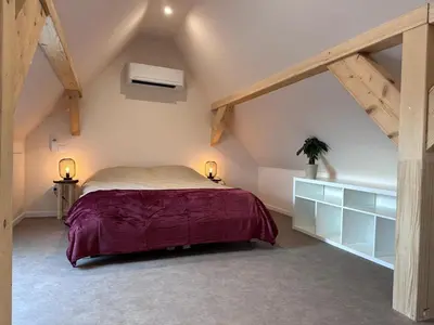 Un ou plusieurs lits dans un hébergement de l'établissement Appartement 2023