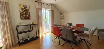 Coin salon dans l'établissement Gîte Les Bleuets