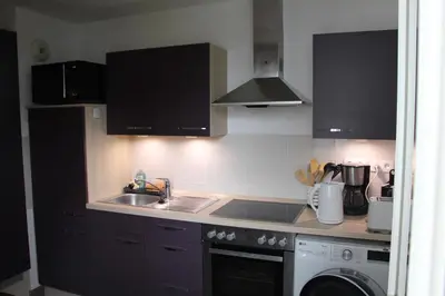Cuisine ou kitchenette dans l'établissement Appartement