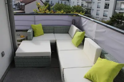 Coin salon dans l'établissement Appartement