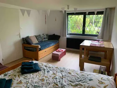 Un ou plusieurs lits dans un hébergement de l'établissement Espace privé dans un parc arboré