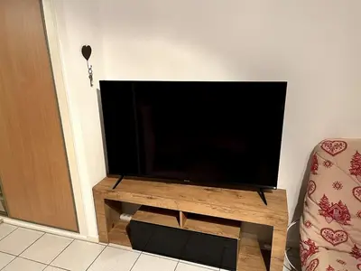 Télévision ou salle de divertissement dans l'établissement Studio du Lac