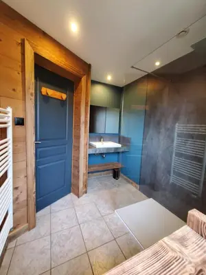 Un ou plusieurs lits dans un hébergement de l'établissement Chalet de la Rougeterre