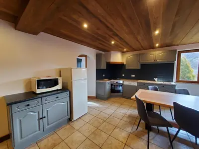 Cuisine ou kitchenette dans l'établissement Chalet de la Rougeterre