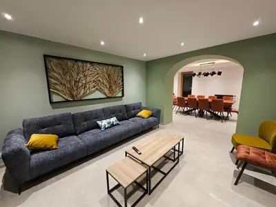 Coin salon dans l'établissement L'Escargot - Maison avec espace bien être privatif