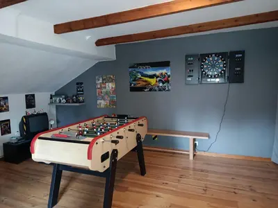 Salle de jeux dans l'établissement Ferme de la Ribotte