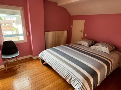 Un ou plusieurs lits dans un hébergement de l'établissement Gîte 205 m2 avec piscine et jacuzzi
