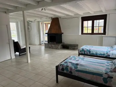 Un ou plusieurs lits dans un hébergement de l'établissement Gîte 205 m2 avec piscine et jacuzzi